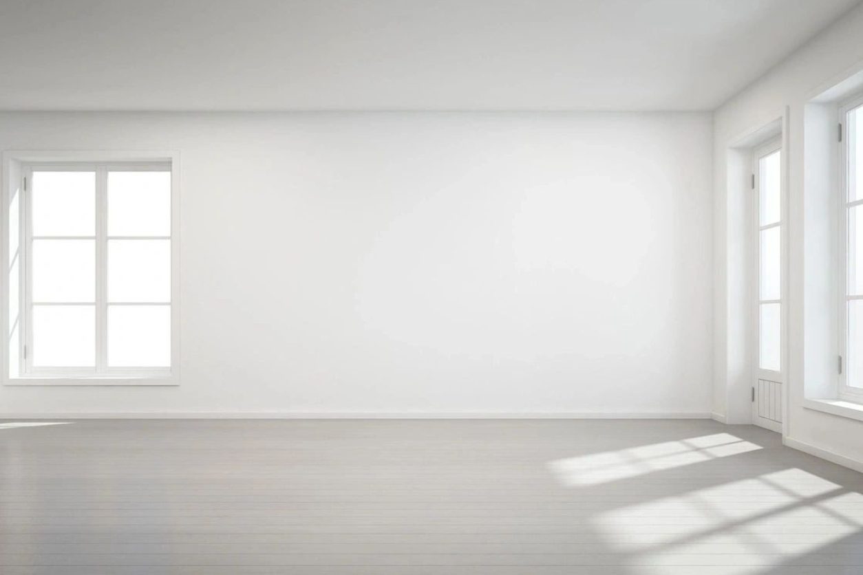 A white room with sunlight coming through the window.